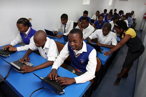 Students attend a class at one of Samsung Electronic's Solar Powered Internet Schools in South Africa. (Samsung Electronics)